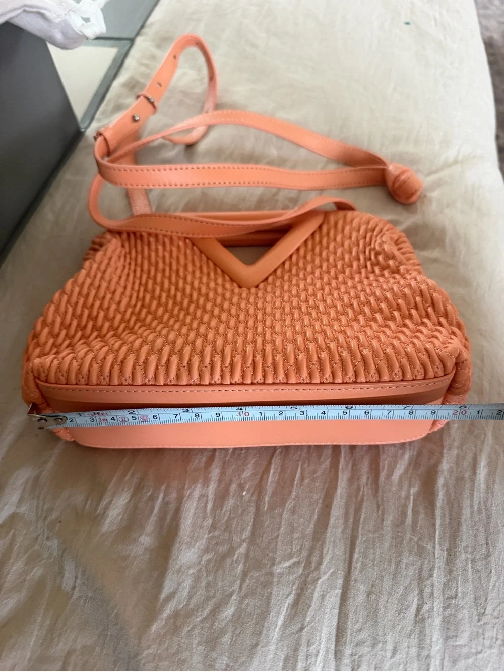 Bottega Veneta small point triangle bag peach lambskin knit